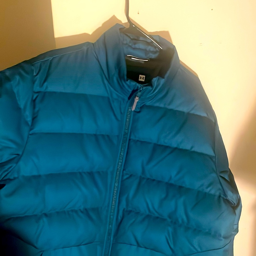 I have a brand new men’s xl under armor jacket  never worn very nice